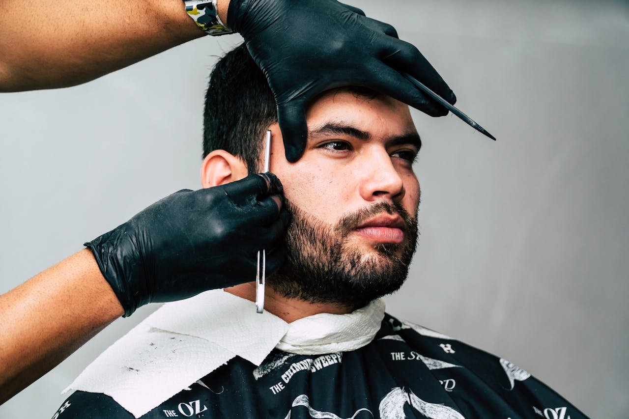man taking beard shave 897262
